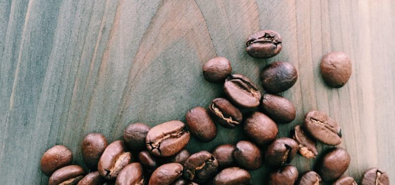 Coffee beans on wood